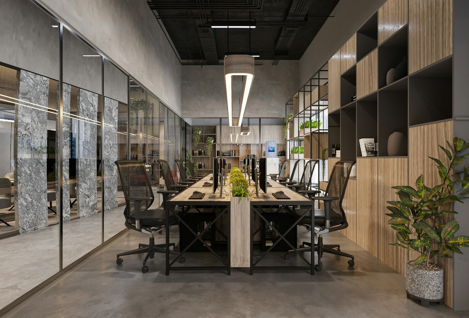 A bright office with glass partitions and long desks